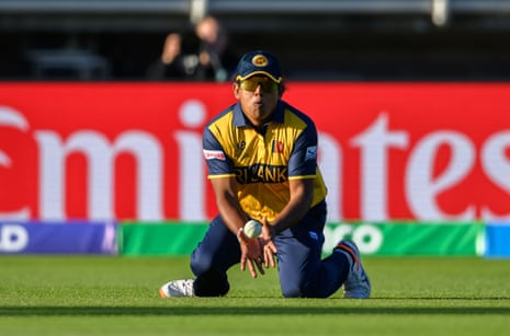 Chamari Athapaththu of Sri Lanka Women takes a catch to dismiss Amy Jones.