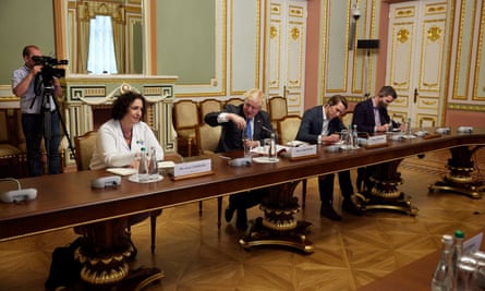 Simmons with Boris Johnson during a meeting with Volodymyr Zelenskiy in June