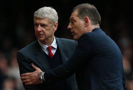 Wenger and Bilic shake hands at the end.