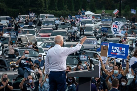 Joe Biden waves to supporters as he finishes speaking during a drive-in campaign rally in Atlanta last week.