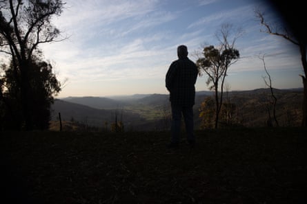 Paul Sturgess looks down the valley from his property above Blowering Dam, NSW.