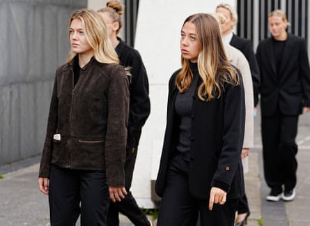 Liverpool players Beata Olsson (left) and Cornelia Kapocs arrive at the memorial service