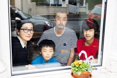 Kazue Ono and husband Tatsuya with their children Kosuke and Arata