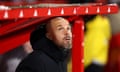 Erik ten Hag looks at the roof of the dugout prior to the FA Cup match between Nottingham Forest and Manchester United