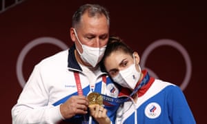 Russian Olympic Committee President Stanislav Pozdnyakov poses with his daughter Sofia Pozdniakova