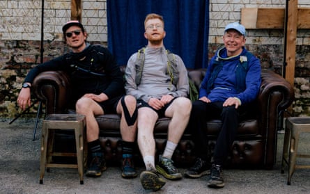The writer (centre) poses for an alternative finish line portrait alongside pals from his Manchester running club.