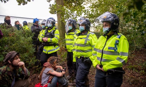 Police officers and environmental protesters in Jones’ Hill wood, Wendover, Buckinghamshire