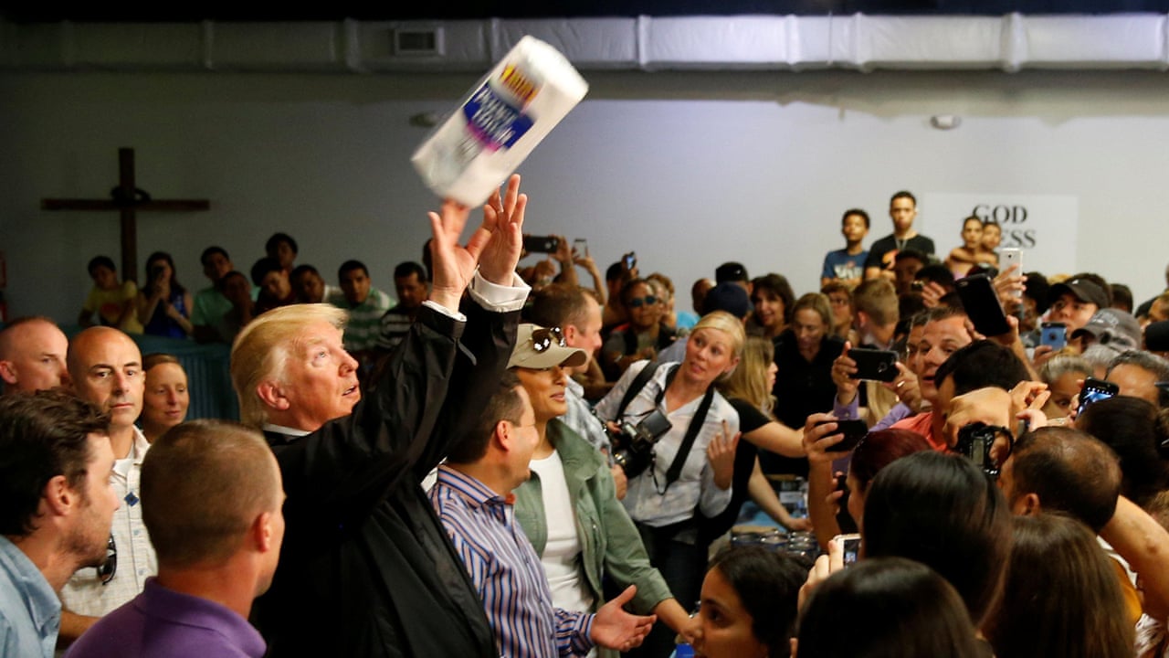 Image result for trump throwing toilet paper in puerto rico