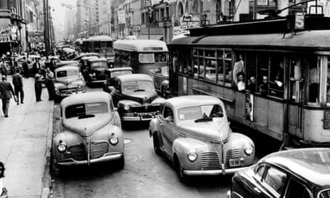 Vehicles stuck in an LA traffic jam. The city’s Pacific Electric streetcar network made its final journey in 1961.