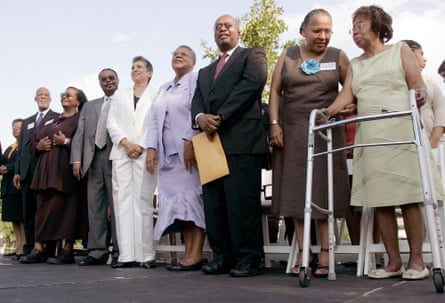 a group of older people standing