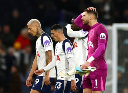 Tottenham’s Guglielmo Vicario, Randal Kolo Muani, Richarlison and Pedro Porro look dejected as they walk off the pitch.