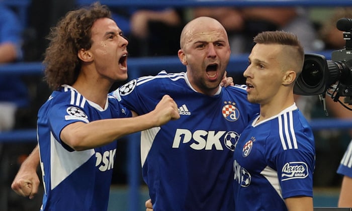 Dinamo Zagreb's Mislav Orsic (right) celebrates scoring their first goal with his team-mates.