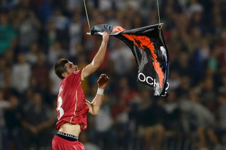 Stefan Mitrovic of Serbia seizes the flag depicting ‘Greater Albania’