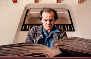 Jack Torrance Looking at the scrapbook of the Overlook Hotel’s past.