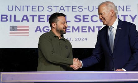 Ukraine’s Volodymyr Zelenskiy and US president Joe Biden shake hands
