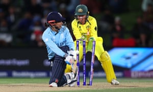 Sophia Dunkley-Brown of England is bowled out by Alana King of Australia.