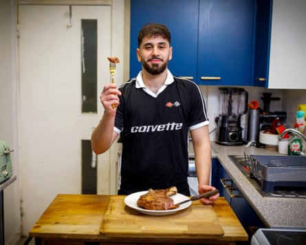 Sammy Gecsoyler holding a fork with a piece of steak on it