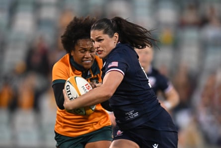 The USA’s Ilona Maher is tackled by Tabua Tuinakauvadra of the Wallaroos at GIO Stadium.