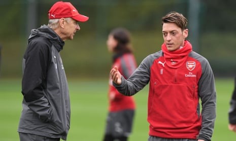 Arsenal Training and Press Conference
ST ALBANS, ENGLAND - NOVEMBER 04: Arsenal manager Arsene Wenger talks to Mesut Ozil during a training session at London Colney