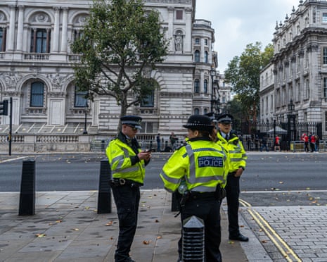 Police officers in Whitehall opposite Downing Street