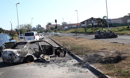 A burnt out vehicle in Phoenix, near Durban