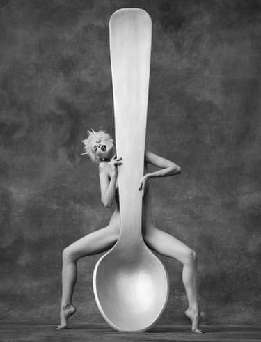 Naked woman with large teaspoon, a photograph by Albert Watson