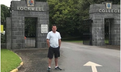 Derek McCarthy of Pennsylvania stands outside the Irish boarding school where he says he was sexually abused repeatedly as a child student in the 1970s.