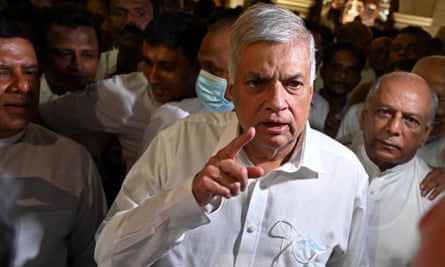 Sri Lanka’s newly elected president Ranil Wickremesinghe talks to reporters in Colombo on Wednesday.