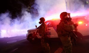 Federal agents police a protest in Portland.