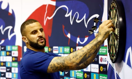 England's Kyle Walker plays darts before the press conference