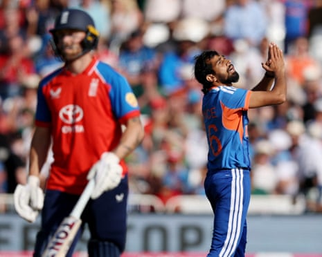 India's Prince Yadav celebrates after taking the wicket of England's Jos Buttler.