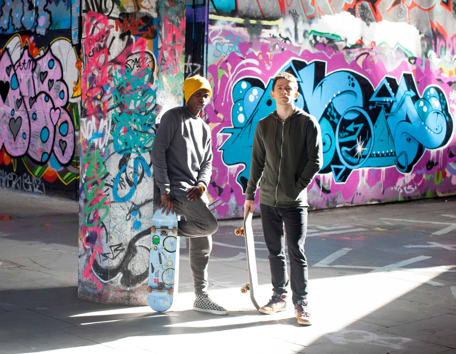 Malik and Hugh Wyeth with skateboards