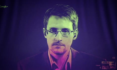 The US National Security Agency (NSA) whistleblower Edward Snowden speaks to European officials via videoconference in June 2014.