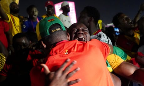 Ghana fans cheer as Ghana scores against Portugal.