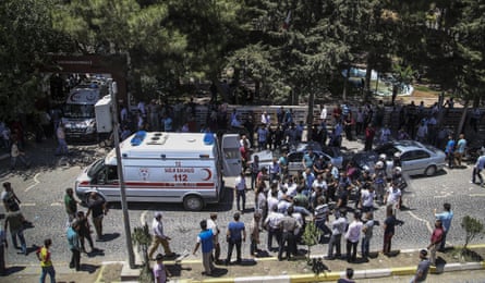 Ambulances picking up the wounded in the aftermath of the explosion.