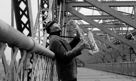 Sonny Rollins plays his saxophone on the Williamsburg Bridge