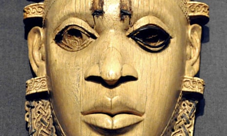 Mask from Benin, 16th century; ivory, iron and copper wire.