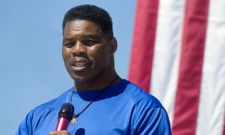 Herschel Walker at a campaign rally in October. Walker denies he pressured the woman, known only as Jane Doe, into having an abortion.