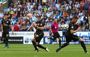 Huddersfield made it two wins from their first two games as Aaron Mooy’s stunning second-half strike saw off fellow promoted side Newcastle at the John Smiths Stadium.