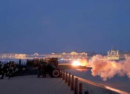 Russian servicemen fire artillery pieces during Victory Day in St Petersburg.