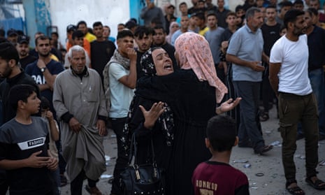 Israel-Hamas war live: White House promises ‘continued flow’ of Gaza aid as Israel steps up airstrikes in north of strip | Israel-Hamas war 15 Women cry as victims are pulled from the rubble of a building which collapsed after an airstrike in Khan Younis, southern Gaza on Saturday.