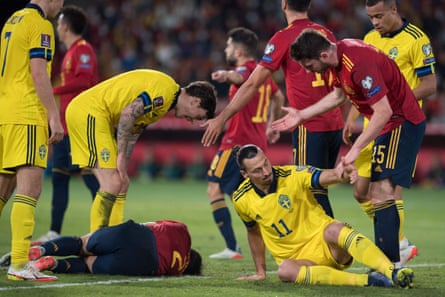 Zlatan Ibrahimovic with the Spain defender César Azpilicueta on the ground during their World Cup qualifier.