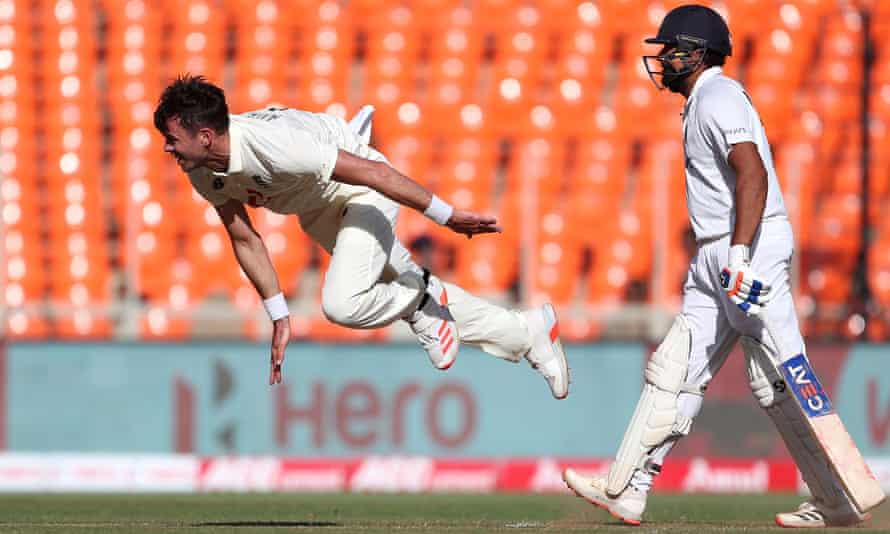 Jimmy Anderson of England bowls as India’s Rohit Sharma backs-up during day one of the fourth Test.