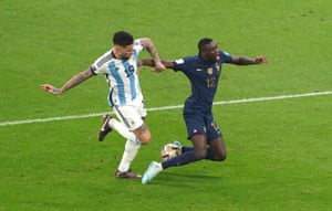 Argentina’s Nicolas Otamendi drags back France’s Randal Kolo Muani to concede a penalty