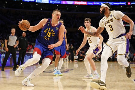 Nikola Jokić, left, has recorded eight triple-doubles during this year’s postseason, breaking Wilt Chamberlain’s previous mark of seven from the 1967 playoffs.