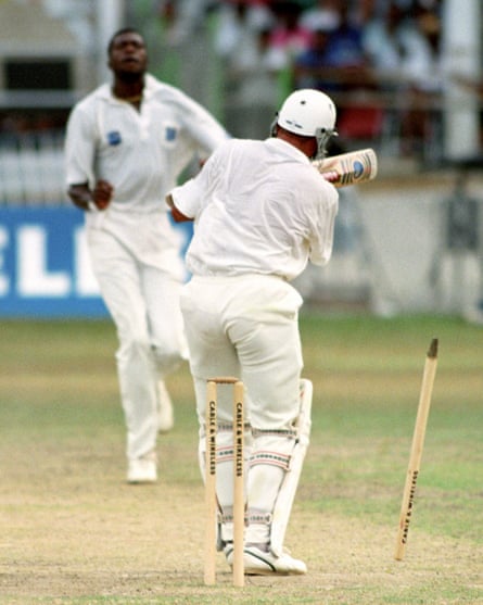 Alec Stewart’s off stump is uprooted by Curtly Ambrose during the final innings of the third Test at the Queen’s Park Oval, during a devastating display of fast bowling. Stewart’s 18 was the highest score of the innings.