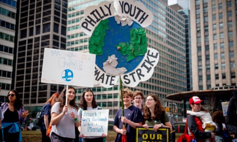 Scores of young people, including students staging a walkout, attend the Philly Youth Climate Strike in Love Park in solidarity with dozens of marches around the world, March 15, 2019. Their concerns include unchecked pollution and other environmental risks they feel are not being addressed by adults in government.