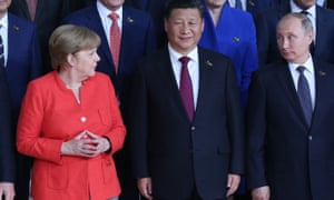 Merkel com Xi Jinping e Vladimir Putin no G20 em Hamburgo em 2017.