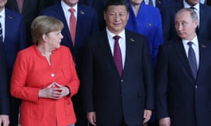 Merkel com Xi Jinping e Vladimir Putin no G20 em Hamburgo em 2017.