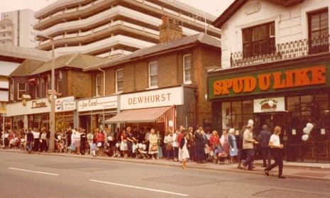 People queue to enter a Spudulike shop